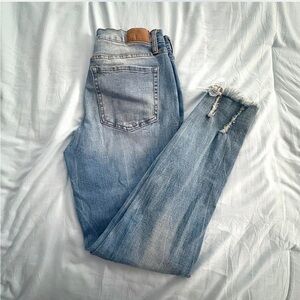 Distressed Blue Denim Jeans